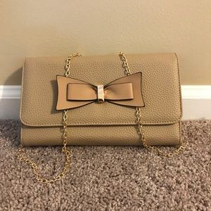 Tan crossbody bow tie purse